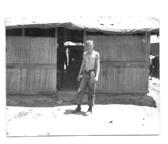 Thats not dirt on my fatigue pants, it sweat stains. I had been stacking sandbags for a bunker.